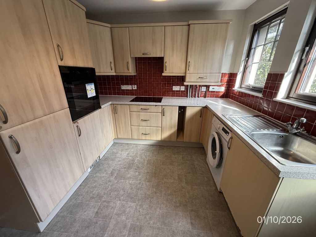Property photo 2 of 12 Kitchen
