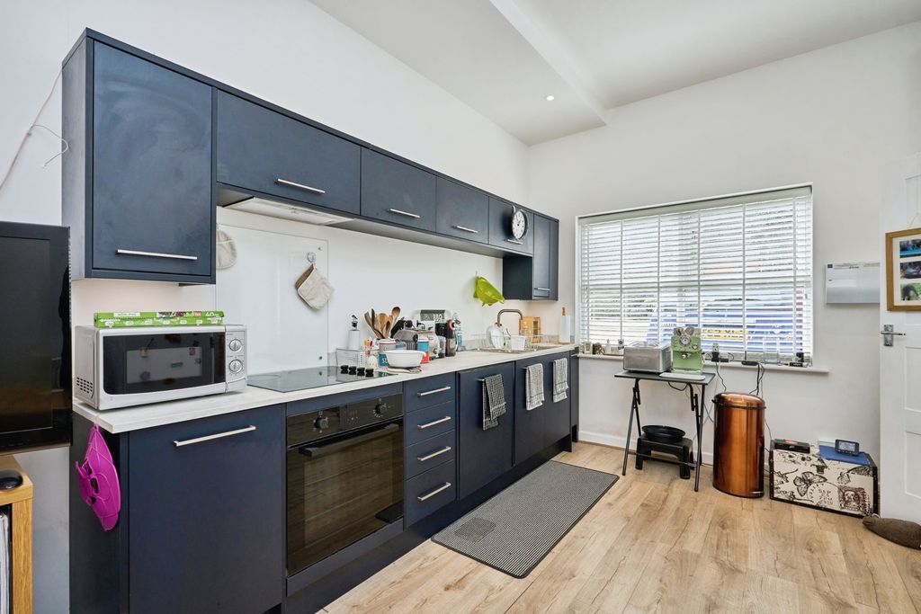 Property photo 2 of 12 Kitchen