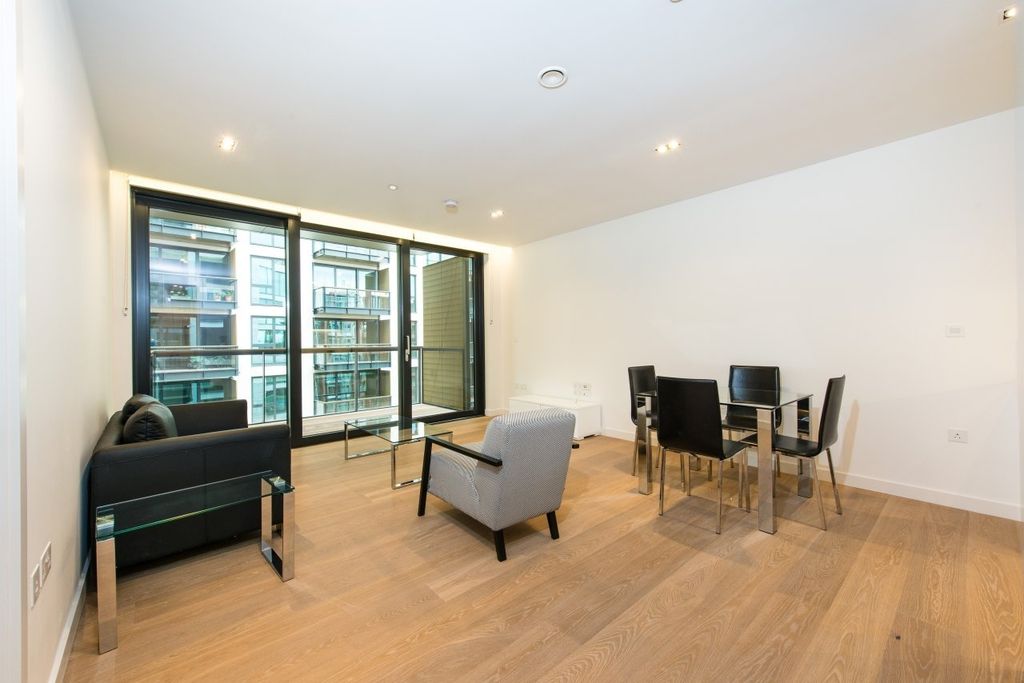 Property photo 1 of 8 Living Area