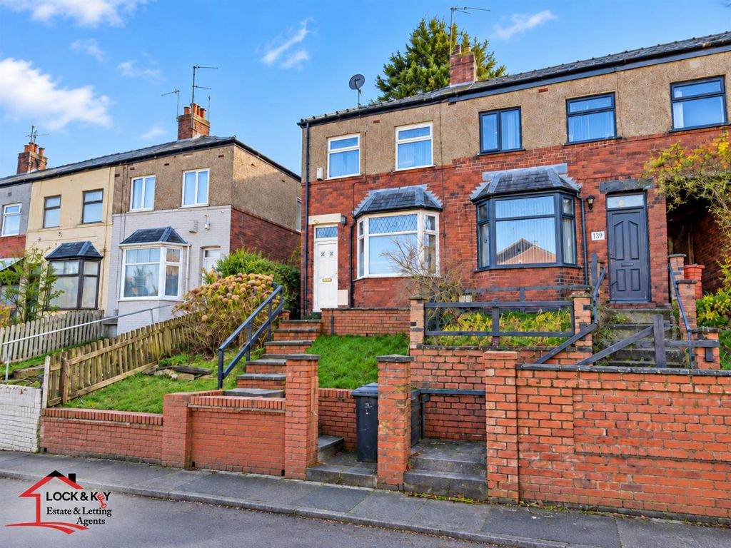 Property photo 1 of 6 Terraced Houses Under Blue Skies.Png