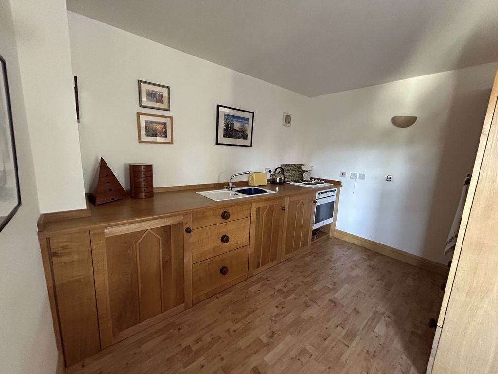 Property photo 3 of 12 Kitchen
