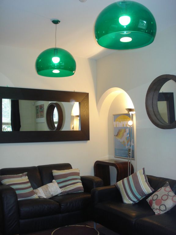 Property photo 2 of 5 A Stylish And Spacious Modern Living Room With Vib...
