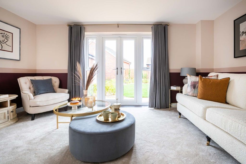 Property photo 1 of 12 French Doors Flood The Room With Light