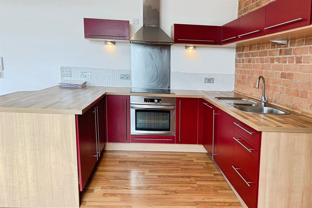 Property photo 3 of 10 Kitchen Area