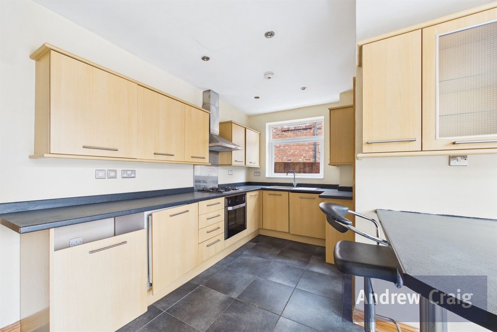Property photo 3 of 12 Kitchen