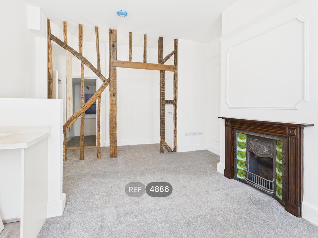 Property photo 3 of 9 Kitchen/Living Area