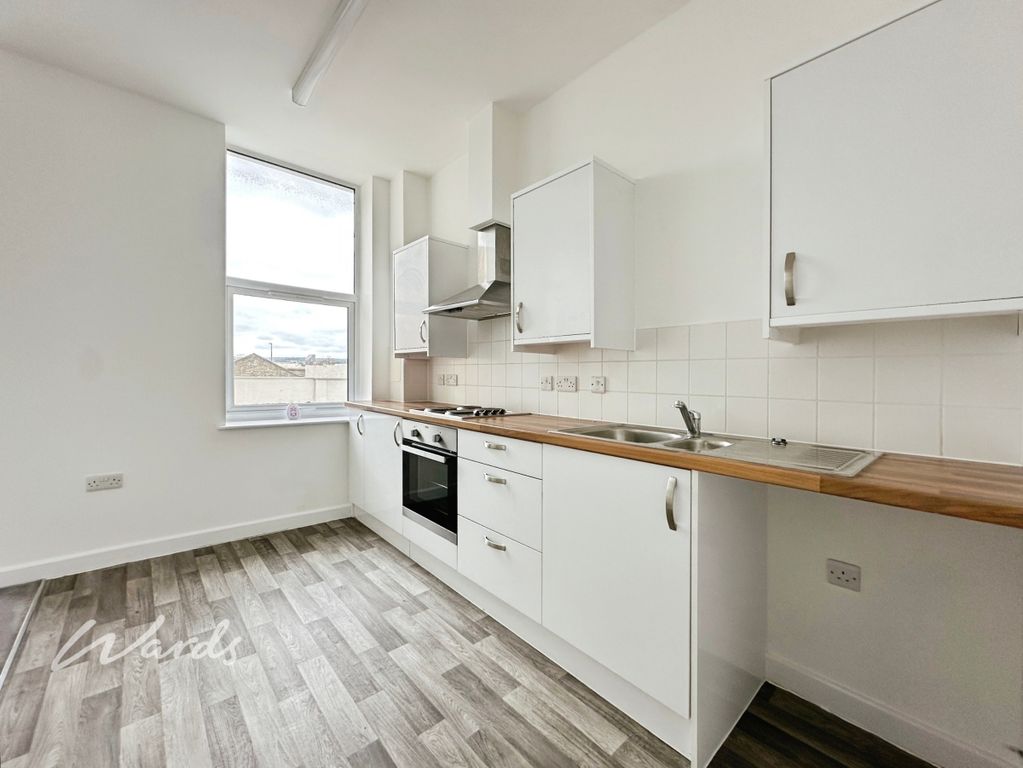 Property photo 2 of 16 Kitchen Area