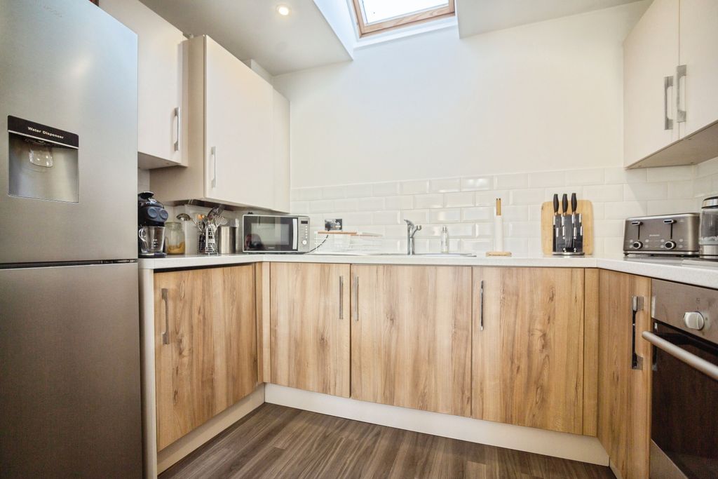 Property photo 3 of 13 Kitchen