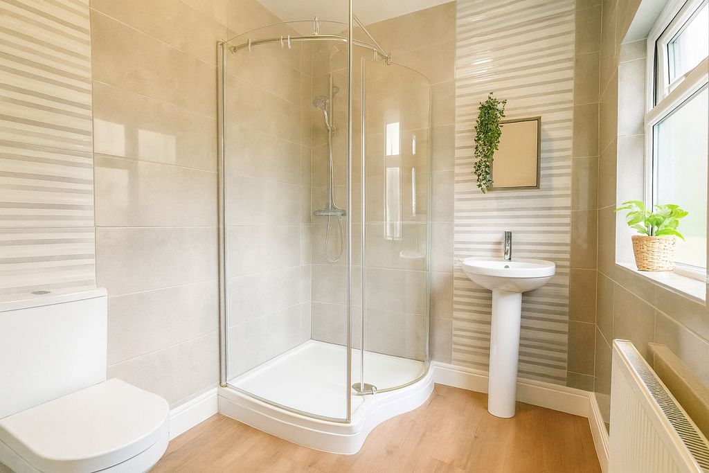 Property photo 3 of 12 Bright And Inviting Modern Bathroom Featuring A Sp...