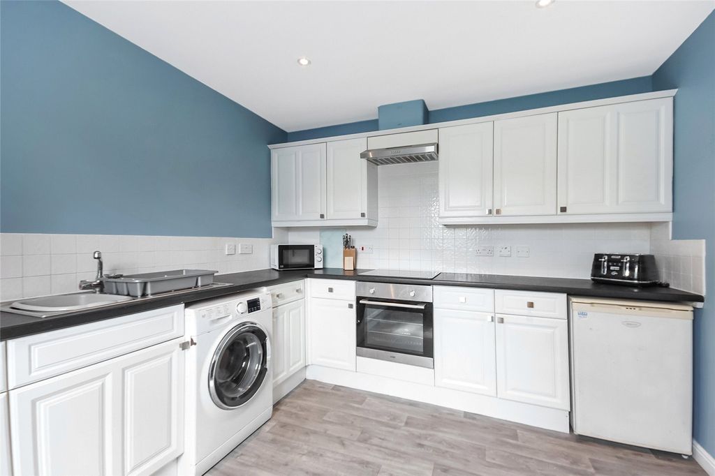 Property photo 3 of 13 Kitchen
