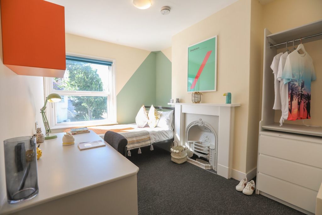 Property photo 3 of 6 Bright, Welcoming Bedroom Featuring A Comfortable ...