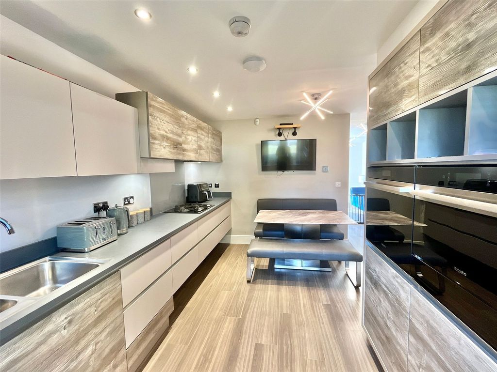 Property photo 3 of 13 Dining Kitchen