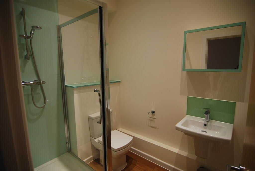 Property photo 3 of 4 Modern Bathroom Featuring A Walk-In Shower With Gl...