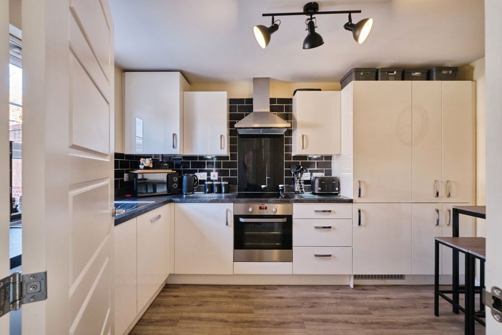 Property photo 2 of 12 Kitchen