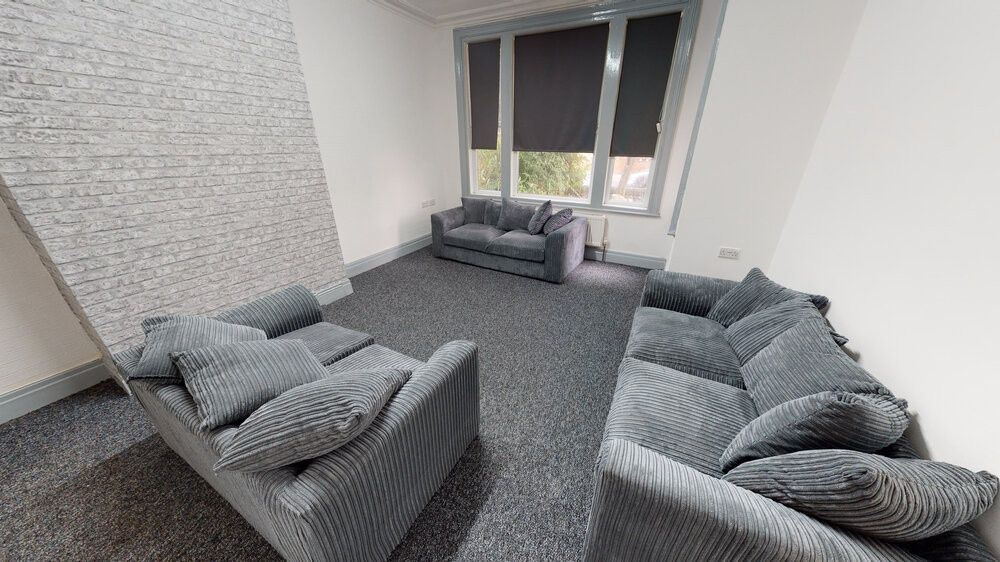 Property photo 1 of 8 A Spacious And Modern Living Room With Comfortable...