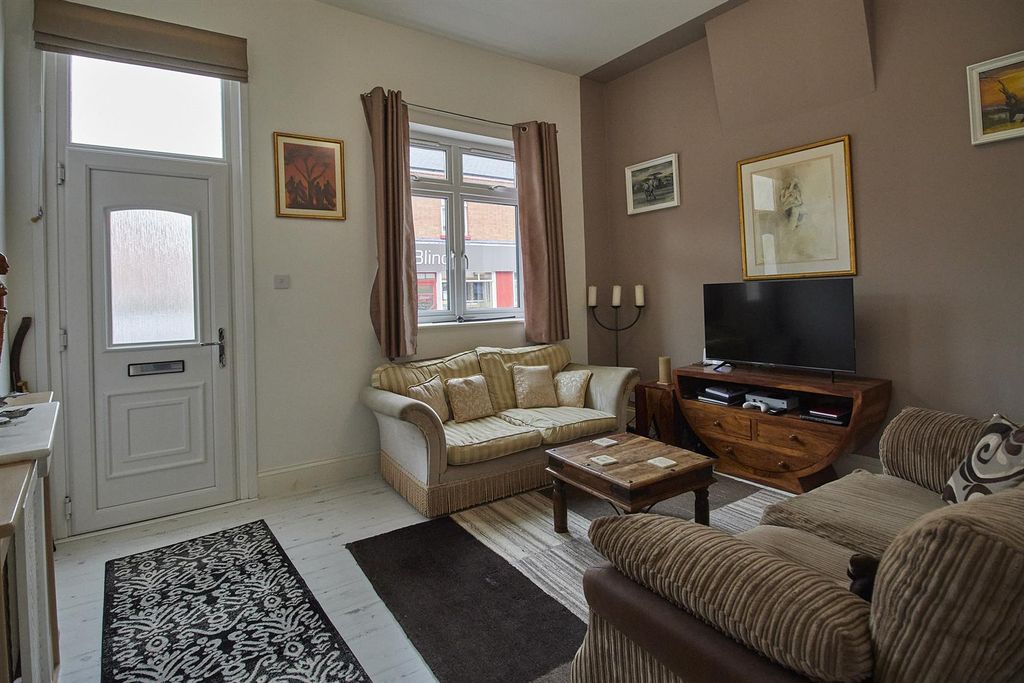 Property photo 2 of 13 Front Lounge