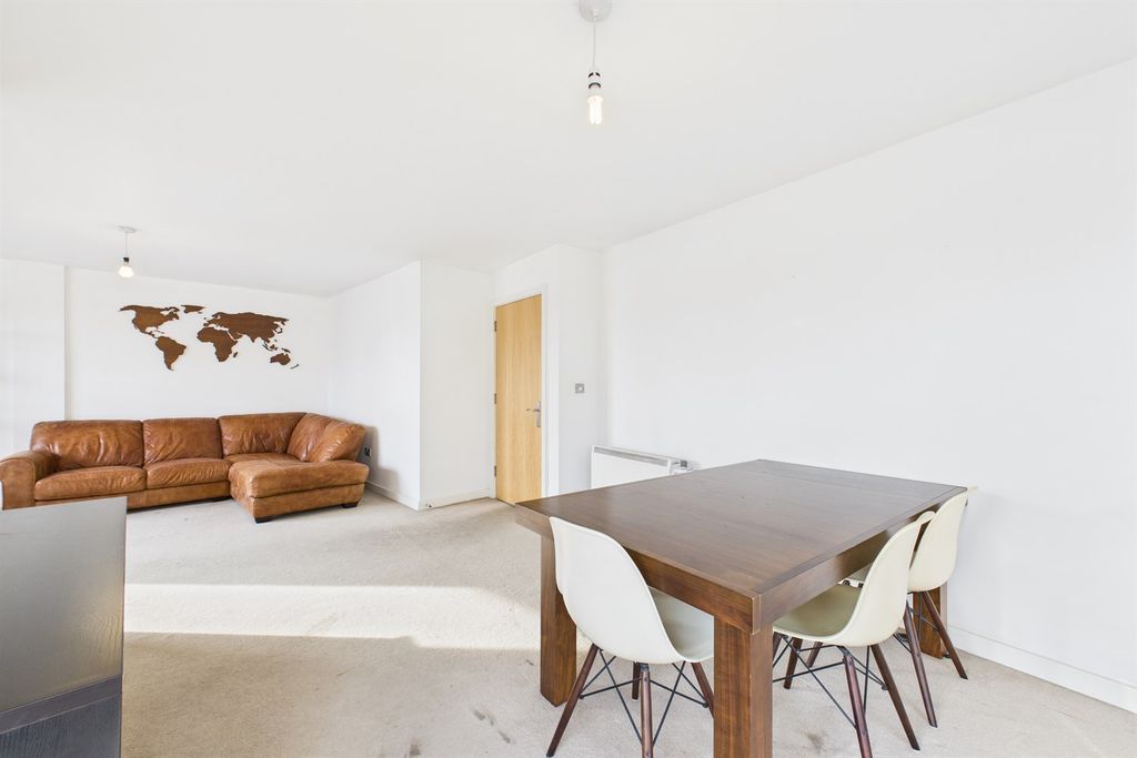 Property photo 3 of 11 Dining/Living Area