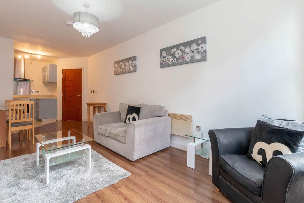 Property photo 2 of 8 Living Area