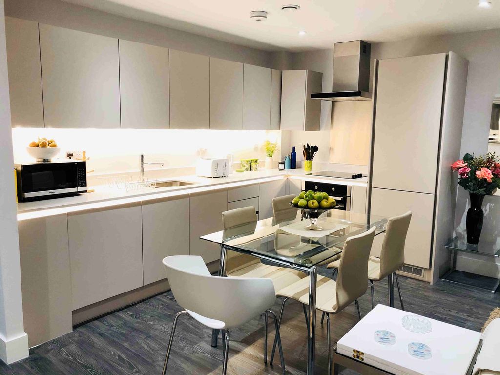 Property photo 3 of 8 Kitchen