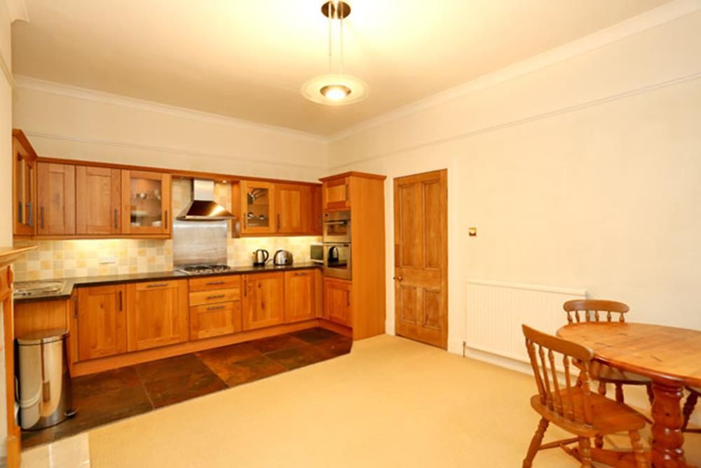 Property photo 3 of 8 Kitchen−1