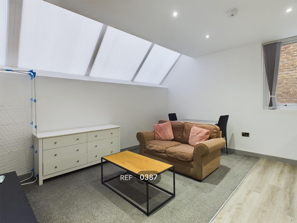 Property photo 2 of 12 Kitchen & Living Area