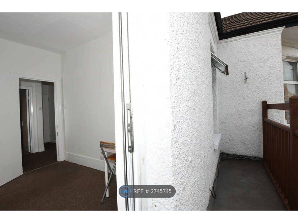 Property photo 2 of 21 Living Room &amp; Balcony