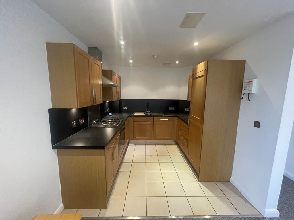 Property photo 3 of 8 Kitchen