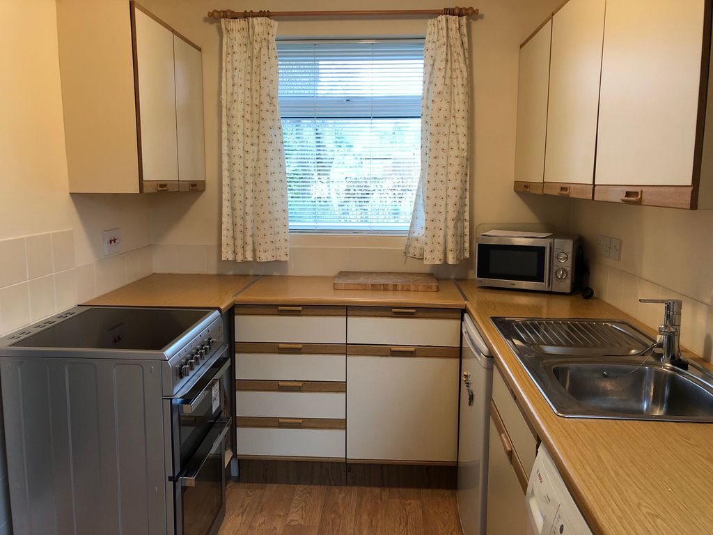 Property photo 2 of 6 Kitchen