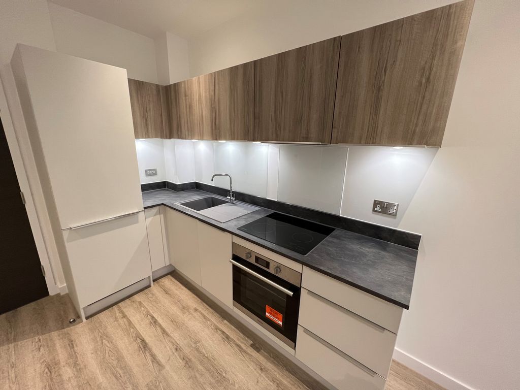 Property photo 3 of 7 Kitchen Area