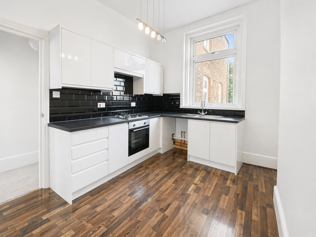 Property photo 3 of 7 Kitchen