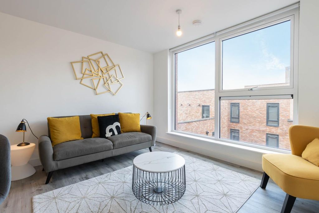 Property photo 2 of 8 Living Area