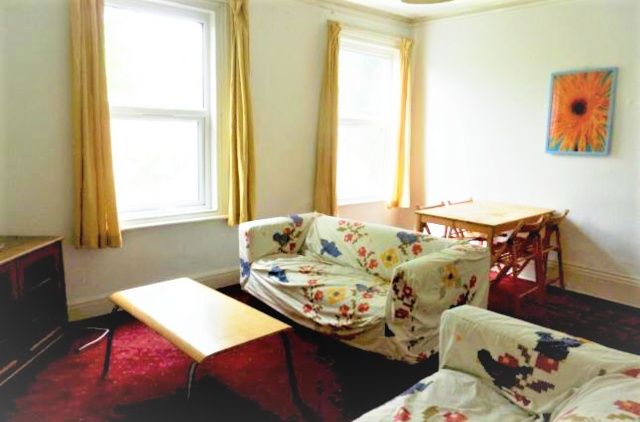 Property photo 2 of 12 A Bright And Welcoming Living Room Featuring Large...