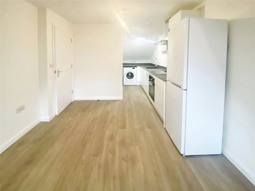 Property photo 2 of 6 Kitchen/Living Area