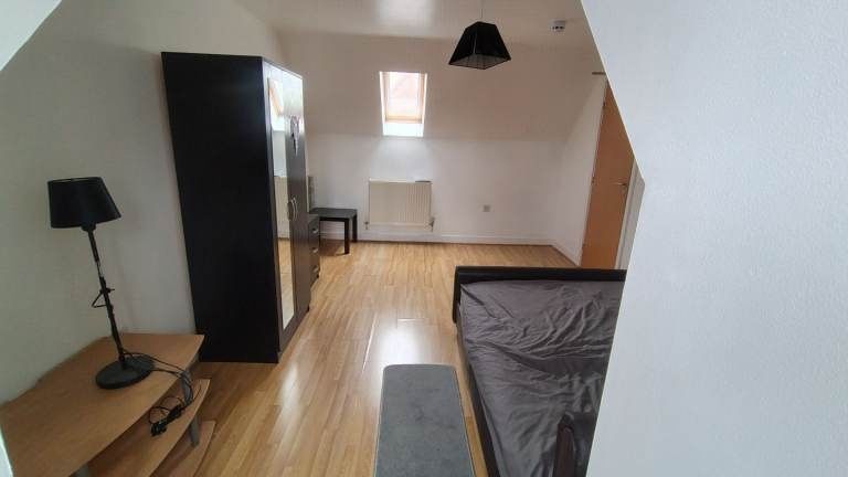Property photo 3 of 4 Bright And Spacious Bedroom With Wood Flooring...