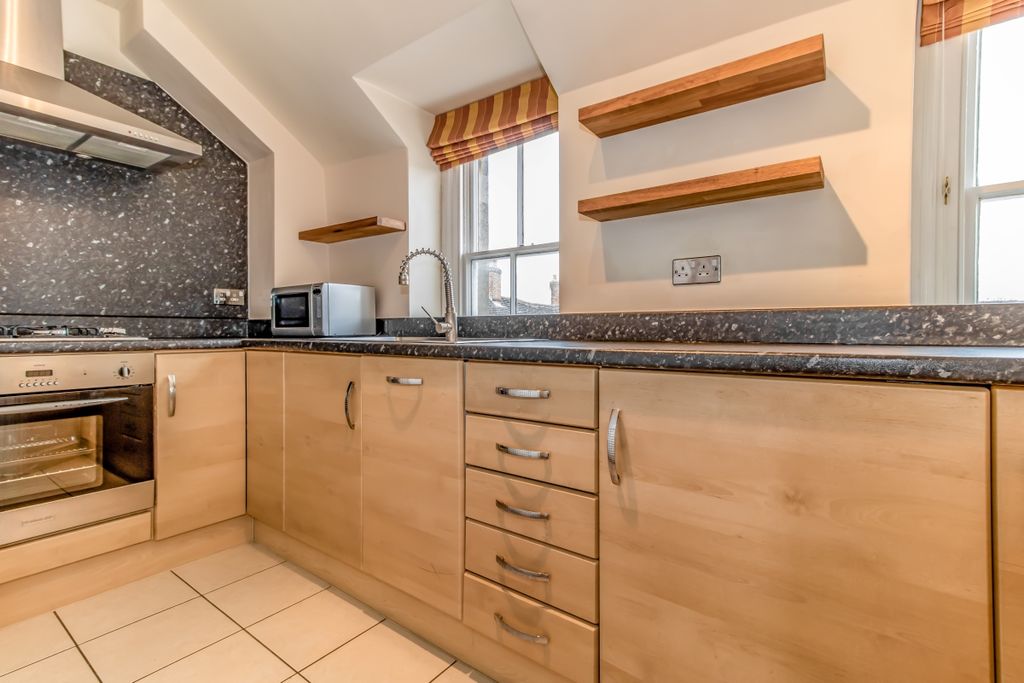 Property photo 2 of 8 Kitchen