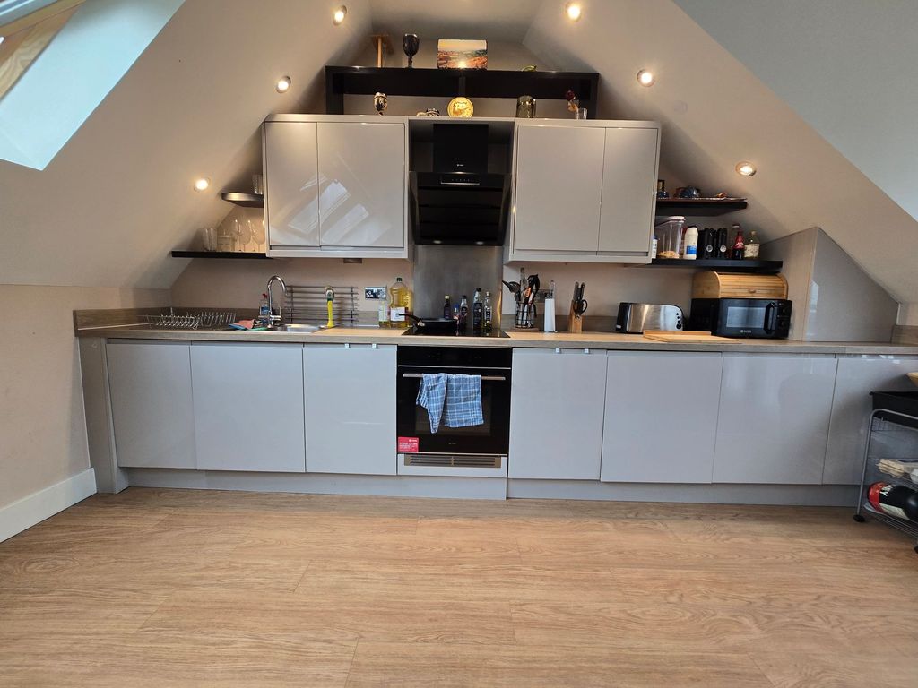 Property photo 3 of 12 Kitchen