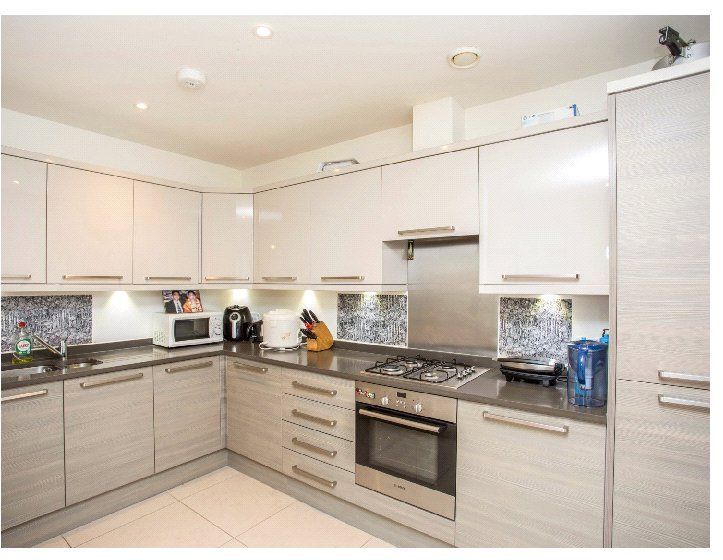 Property photo 3 of 8 Kitchen