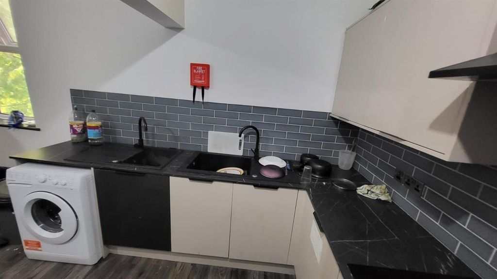 Property photo 2 of 7 Modern Kitchen With Stylish Slate Grey Tiling...