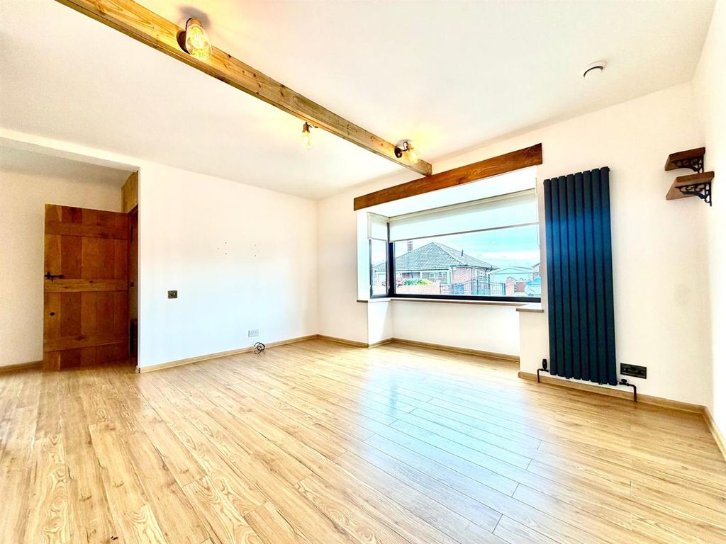 Property photo 3 of 18 Living Room: