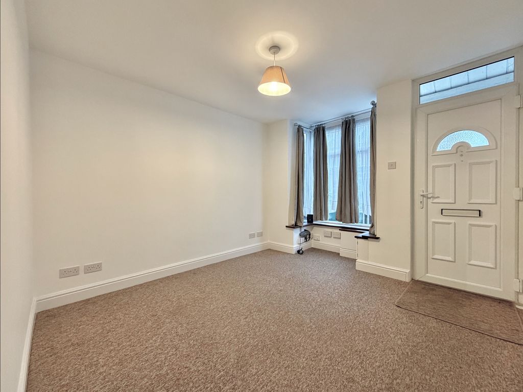 Property photo 2 of 12 Living Room