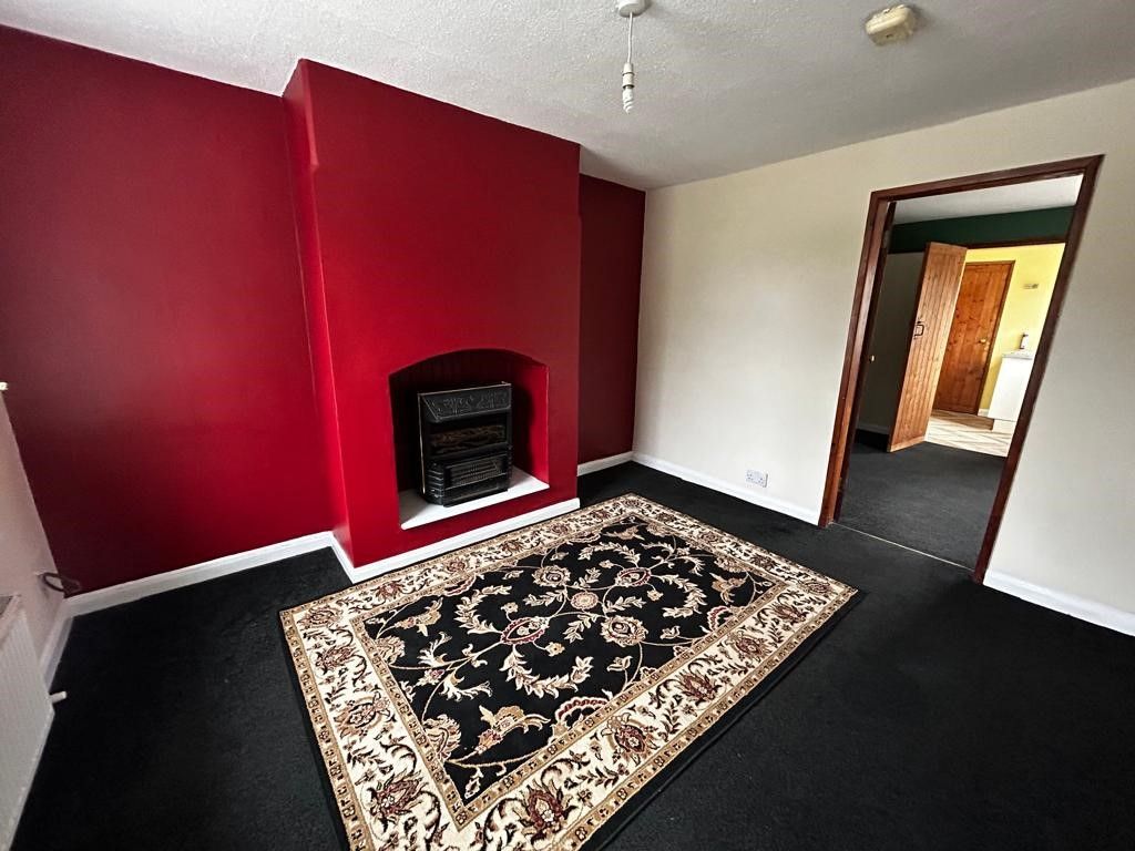 Property photo 3 of 12 Living Room