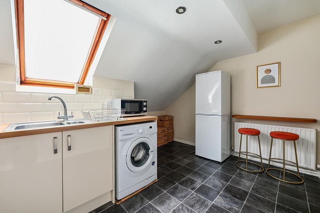 Property photo 2 of 11 Kitchen