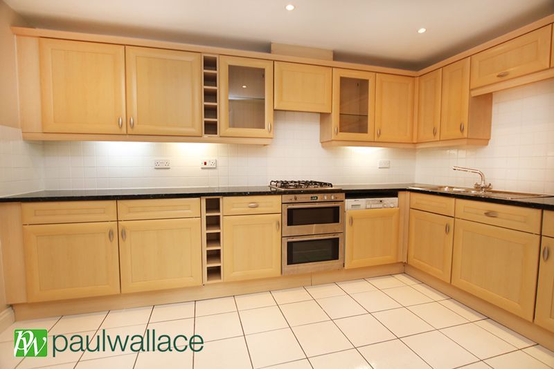 Property photo 2 of 12 Kitchen