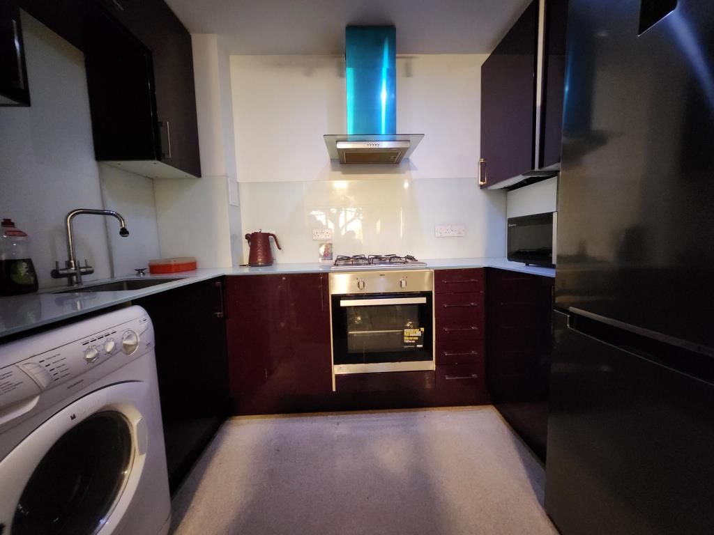 Property photo 3 of 8 Kitchen