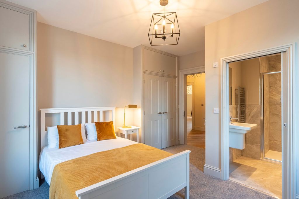 Property photo 1 of 7 Bright, Well-Styled Bedroom With A White Wooden Be...