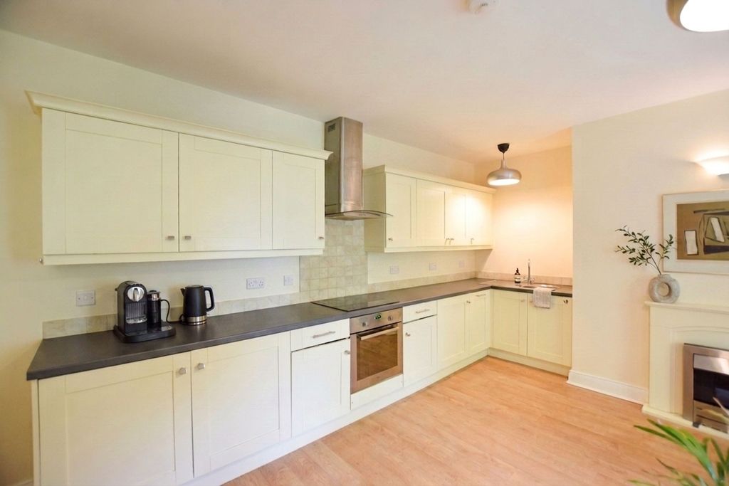 Property photo 2 of 12 Kitchen