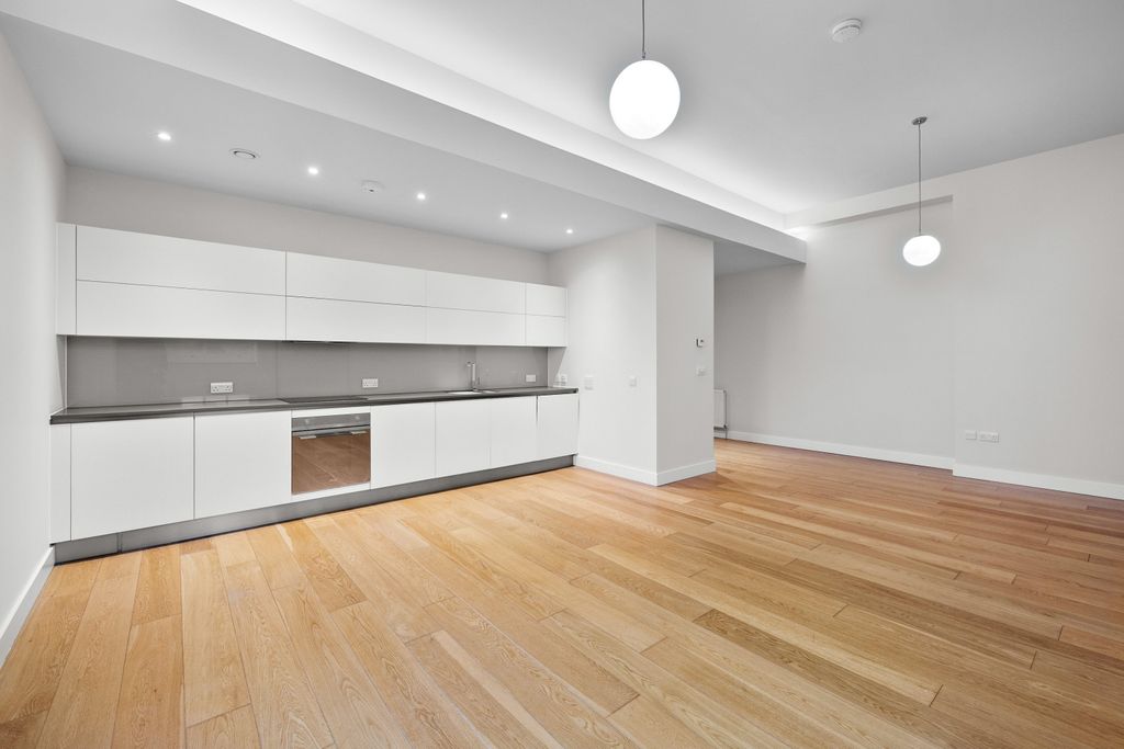 Property photo 2 of 12 Kitchen Living