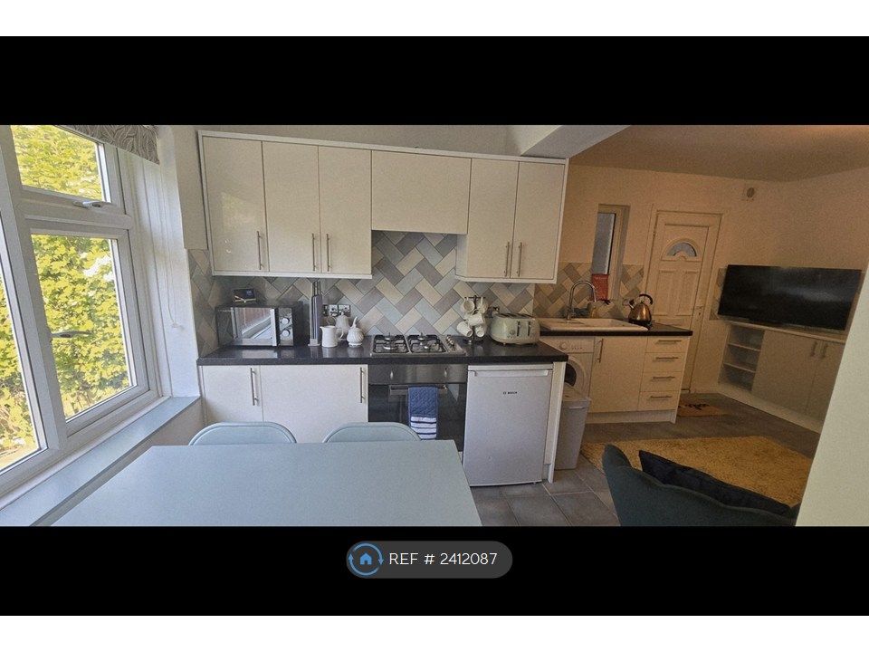 Property photo 2 of 12 Kitchen