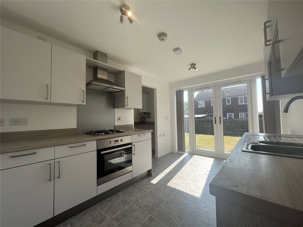 Property photo 3 of 9 Kitchen