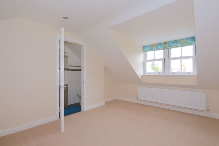 Property photo 3 of 8 Attic Bedroom